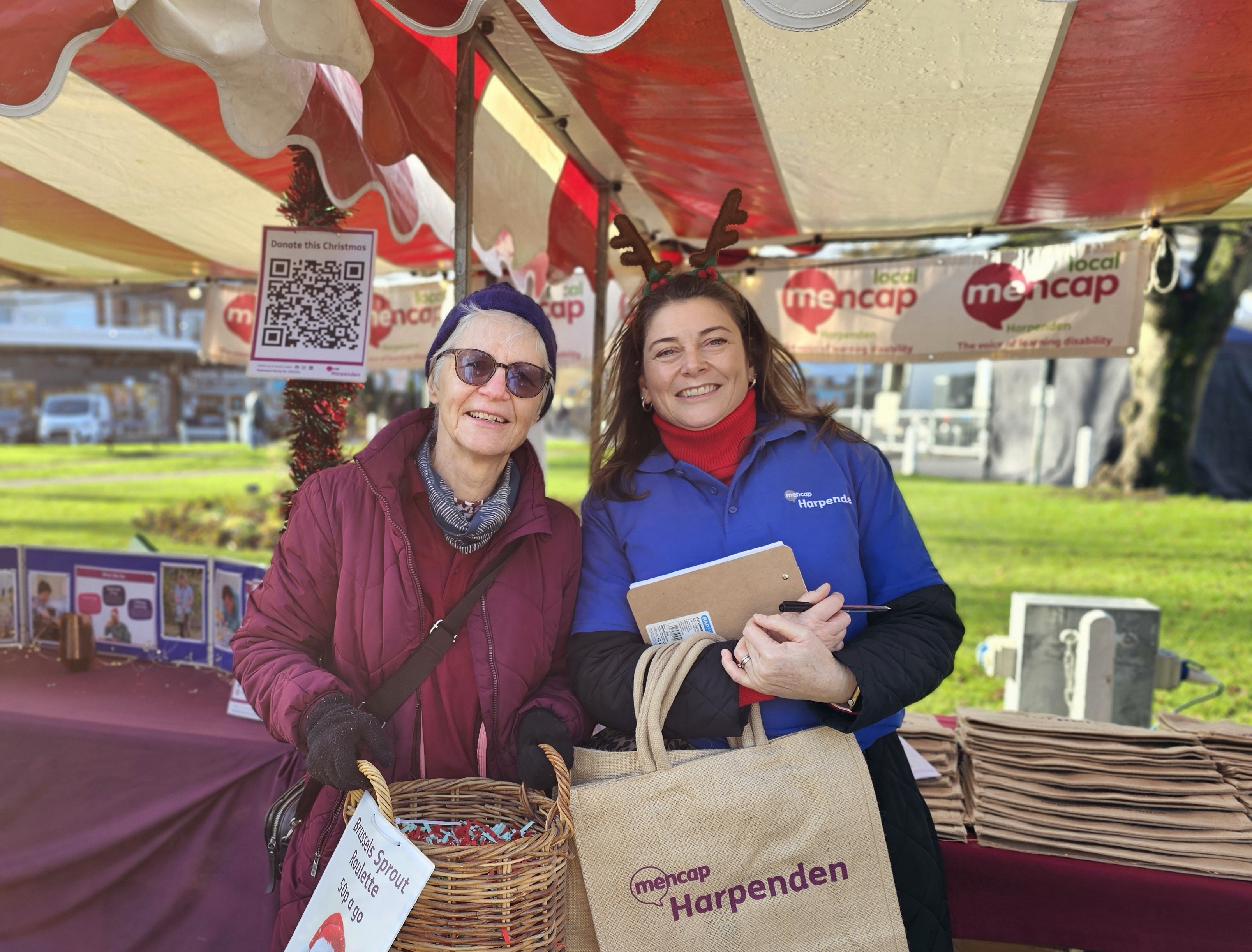 Two volunteers supporting our stall at the Harpenden Carnival.