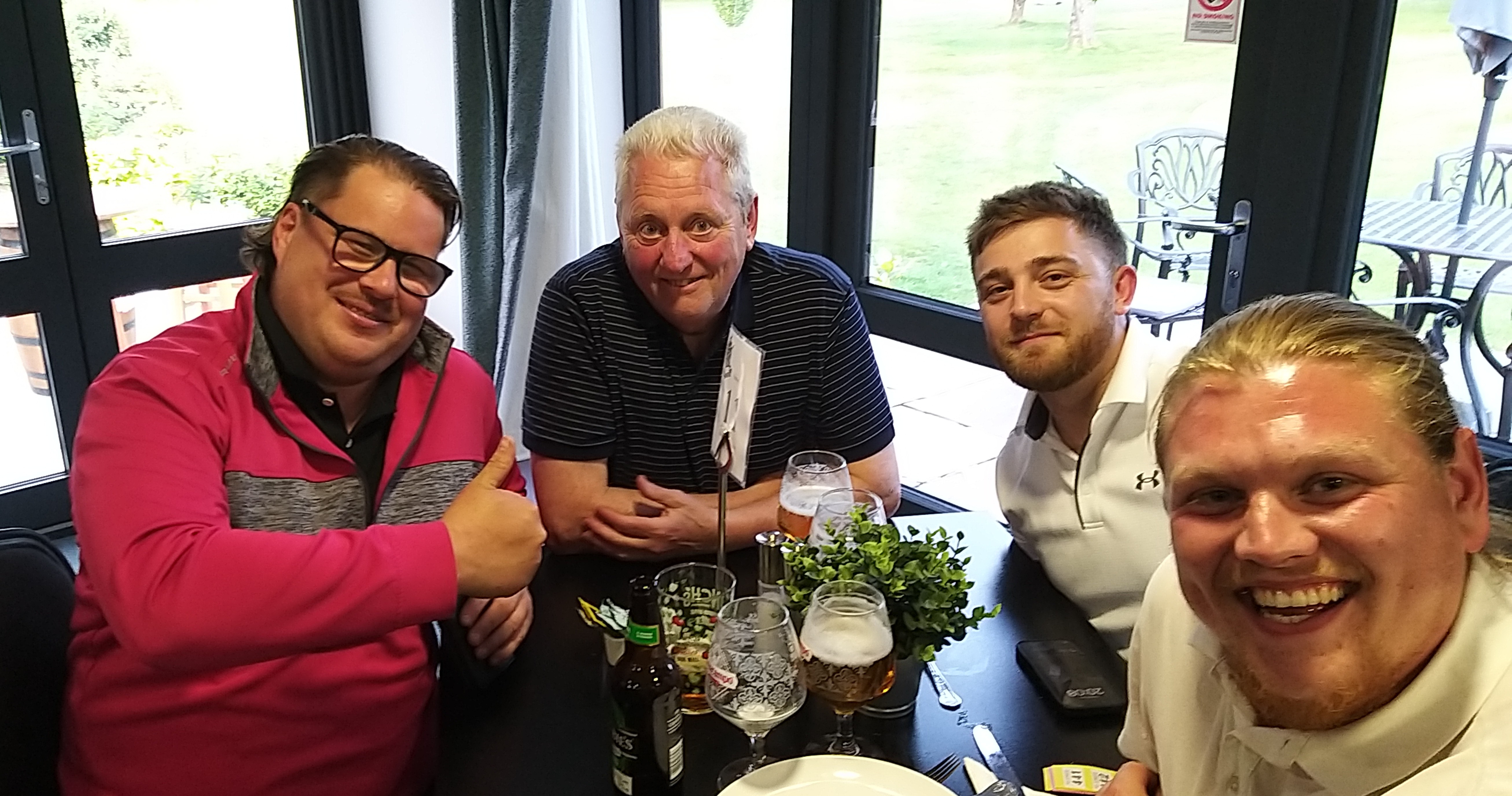 Happy and rested players pose for photos during the evening meal.