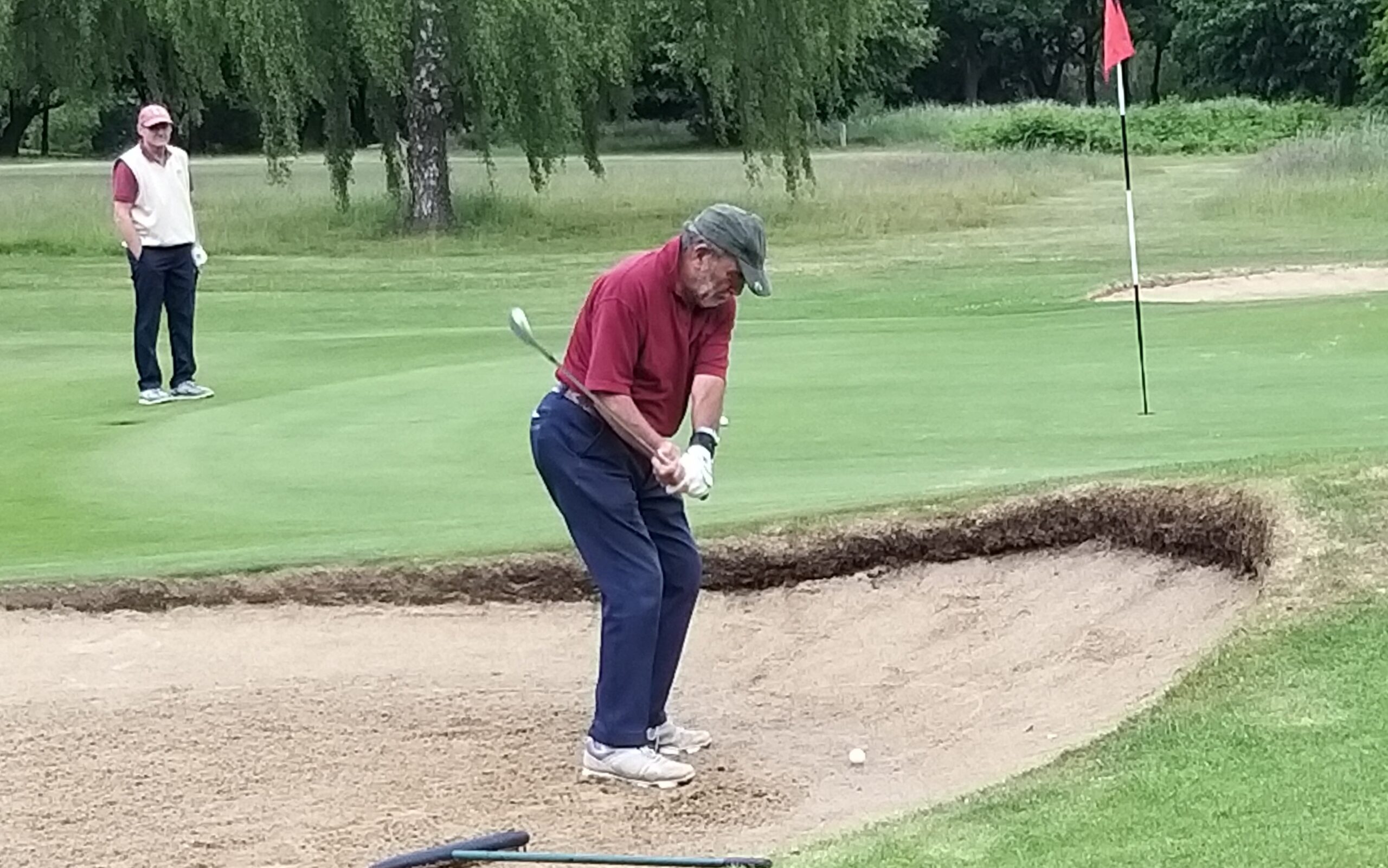 A player trying to get out of a bunker.