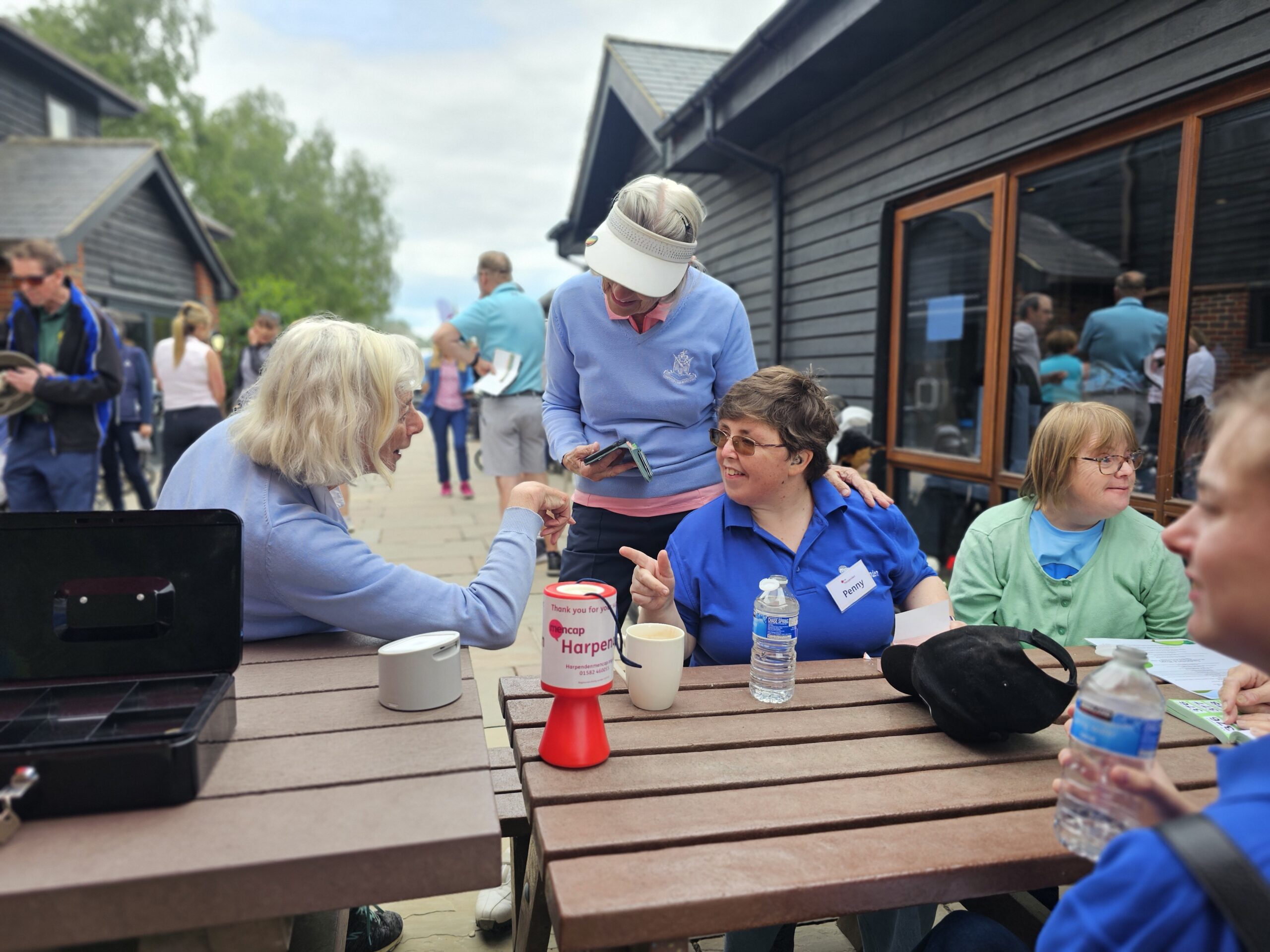 The Common Girls and volunteers get talking